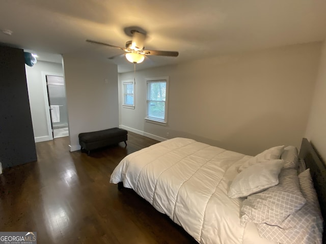 bedroom with ceiling fan and dark hardwood / wood-style flooring