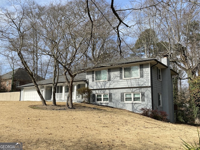 view of front of property featuring a garage