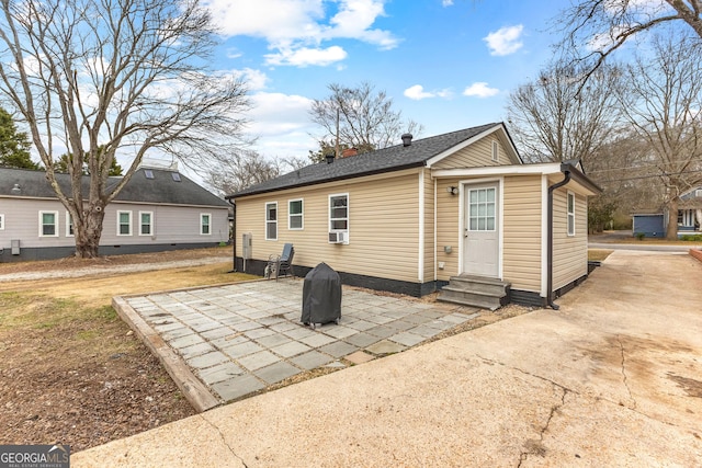 rear view of house featuring a patio area