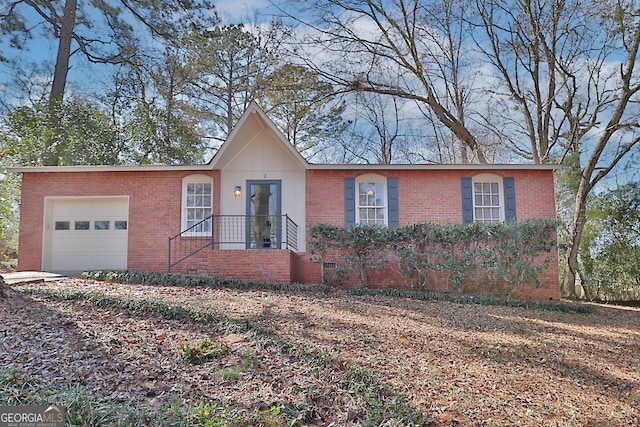 single story home featuring a garage