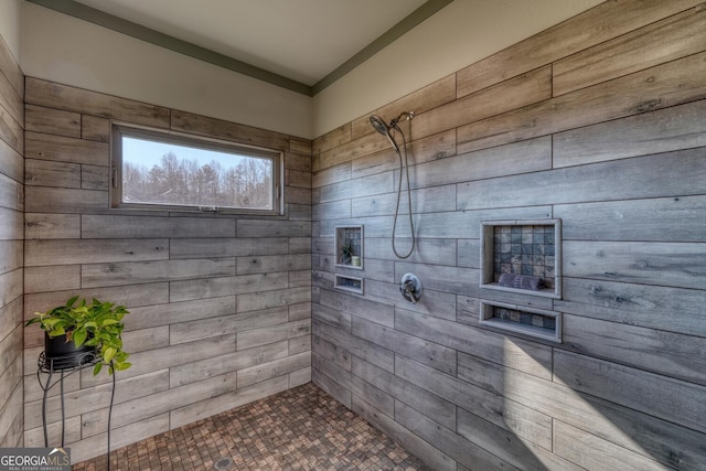 bathroom with tiled shower