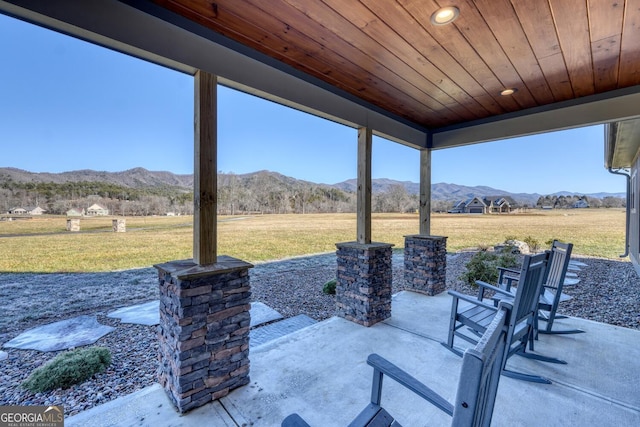 view of patio with a mountain view