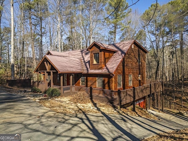 view of front of property featuring covered porch