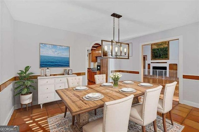 dining area featuring a chandelier