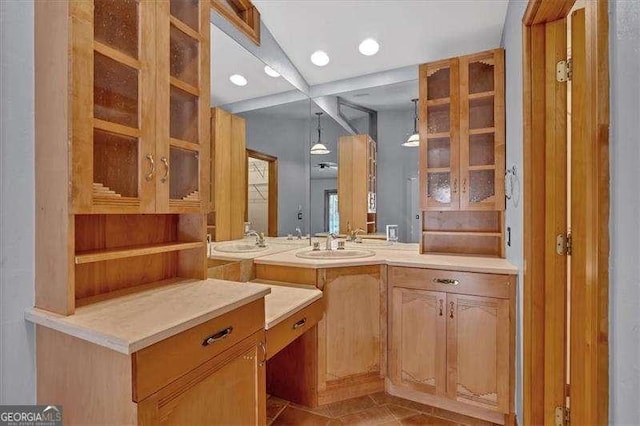 bathroom featuring tile patterned floors and vanity