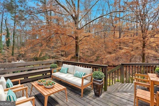 deck featuring an outdoor living space