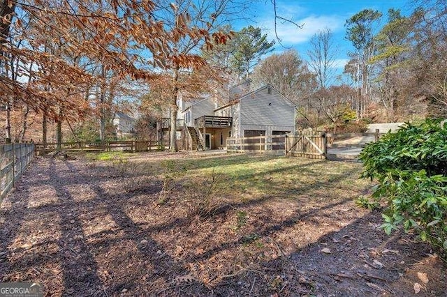 view of yard featuring a wooden deck