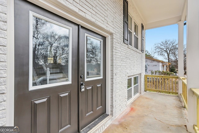 property entrance with a porch