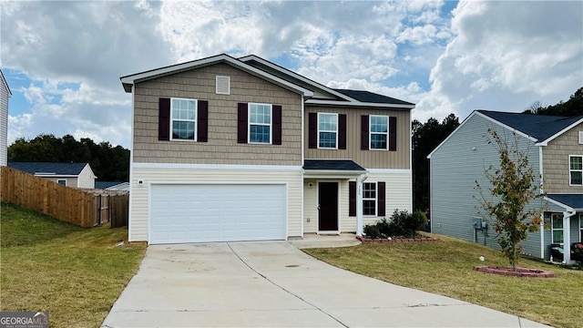 front facade featuring a garage and a front yard