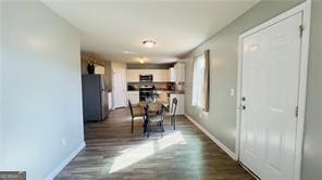 720 Dove Tree Ln, Social Circle, GA 30025 - interior space with dark hardwood / wood-style flooring