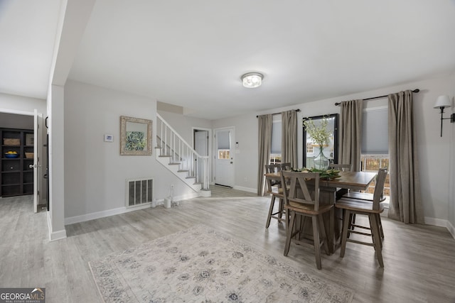 dining room featuring light wood-type flooring