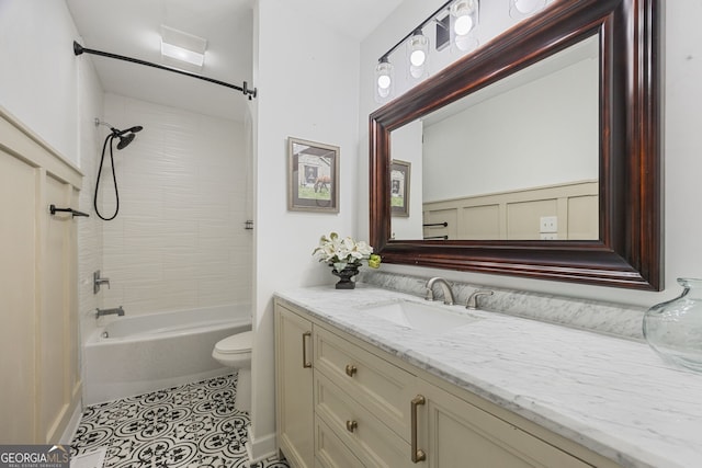 full bathroom with shower / bathtub combination, vanity, toilet, and tile patterned flooring