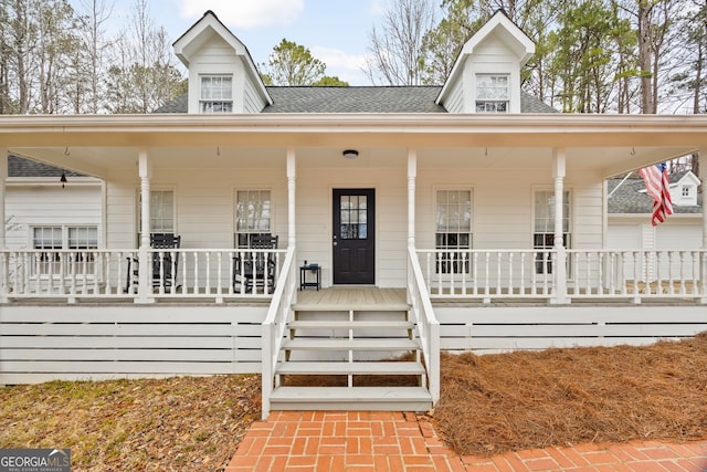 view of front of home featuring covered porch