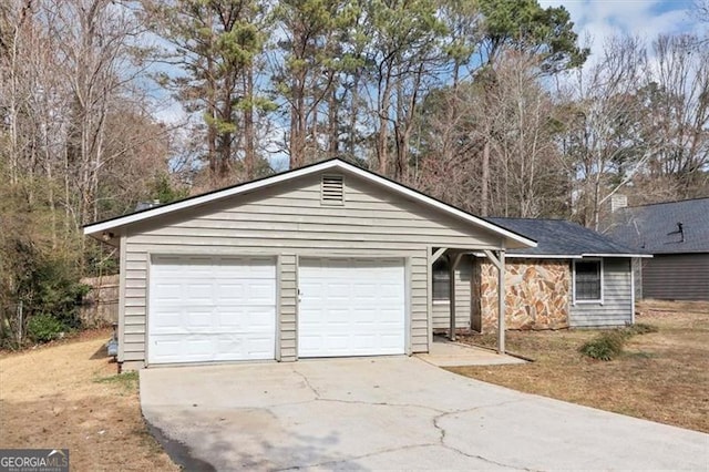 single story home featuring a garage