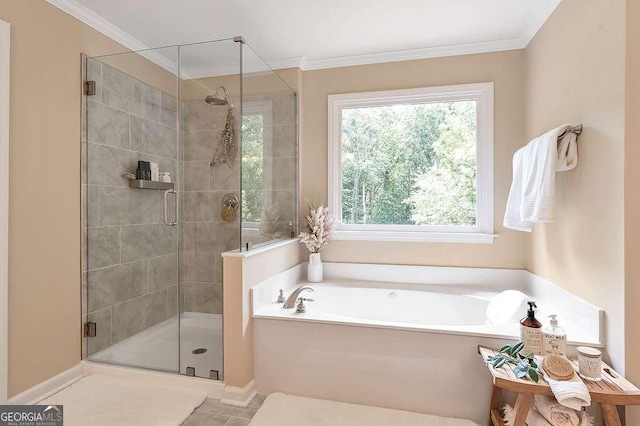 bathroom featuring ornamental molding and plus walk in shower