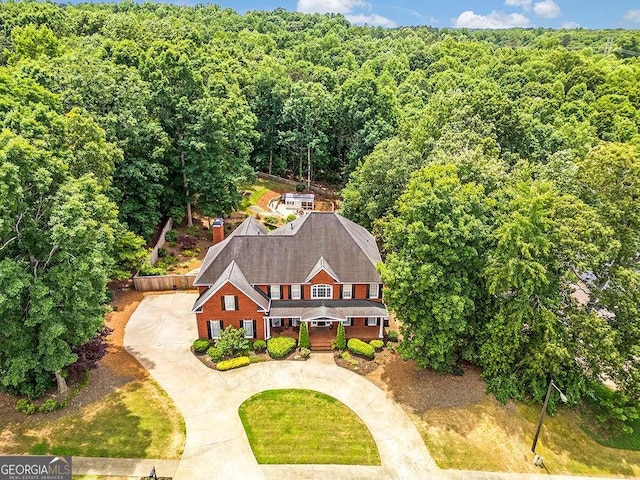 bird's eye view featuring a view of trees