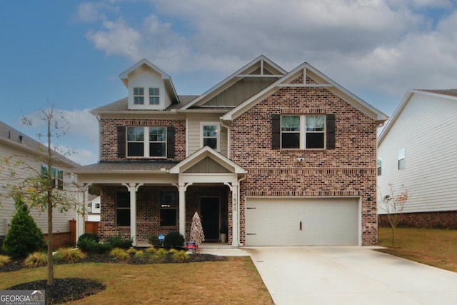 craftsman-style home featuring a garage, brick siding, concrete driveway, board and batten siding, and a front yard