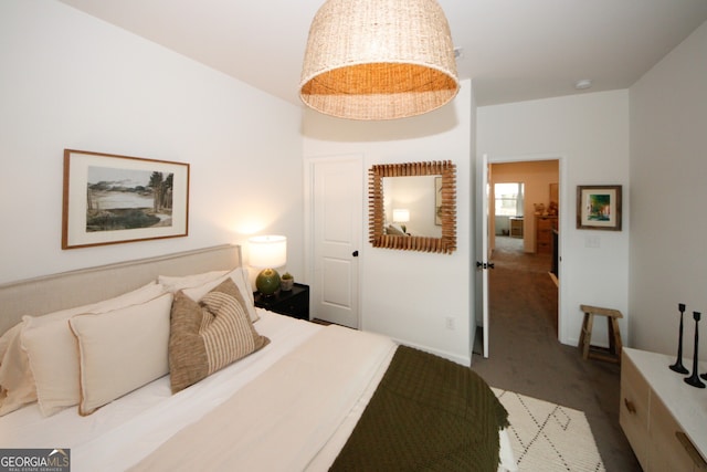 bedroom featuring light colored carpet