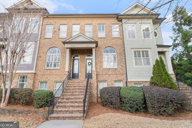 multi unit property featuring brick siding