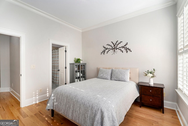 bedroom featuring crown molding and wood-type flooring