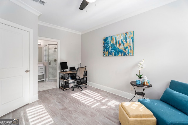 office area featuring ceiling fan, ornamental molding, and light hardwood / wood-style floors