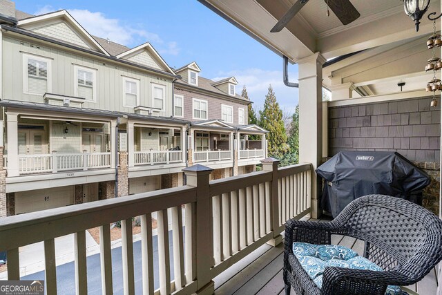 balcony featuring a grill and ceiling fan