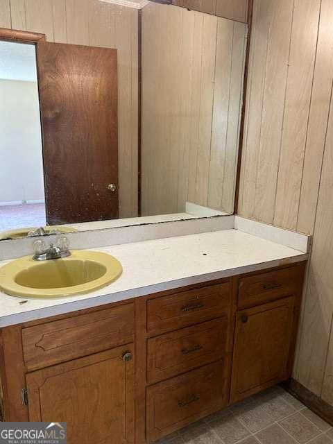 bathroom featuring tile patterned floors and vanity