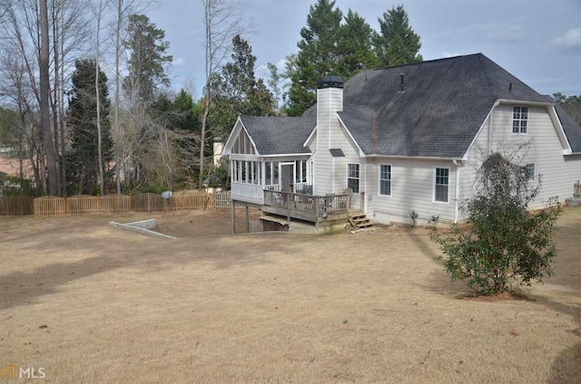 rear view of house with a deck