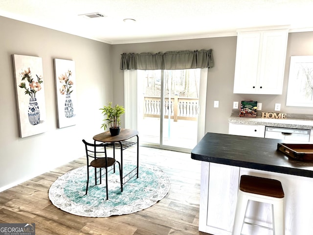 dining room featuring light hardwood / wood-style floors