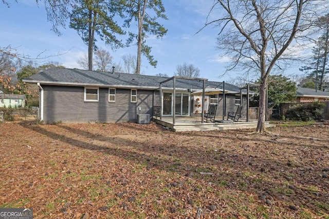 back of property featuring cooling unit and a patio area