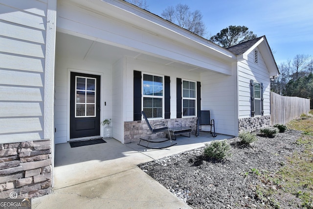 entrance to property with covered porch