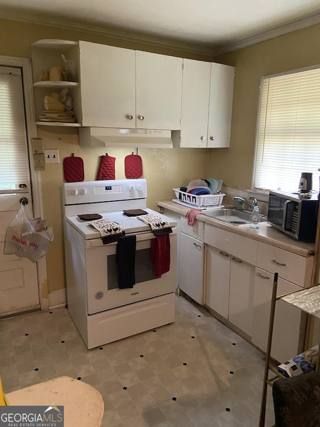 kitchen with white range with electric cooktop, ornamental molding, sink, and white cabinets