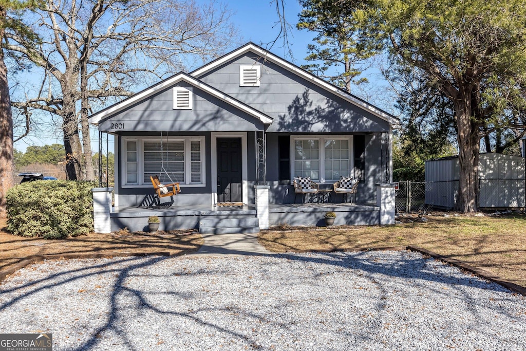 bungalow-style home with a porch