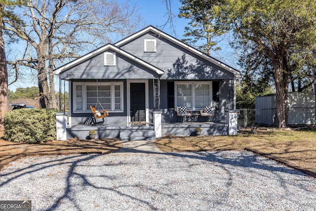 bungalow-style home with a porch