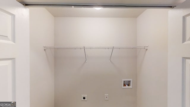 laundry area with electric dryer hookup and hookup for a washing machine