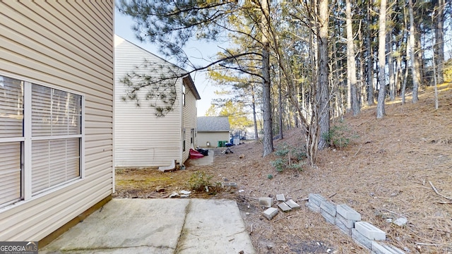 view of yard with a patio area