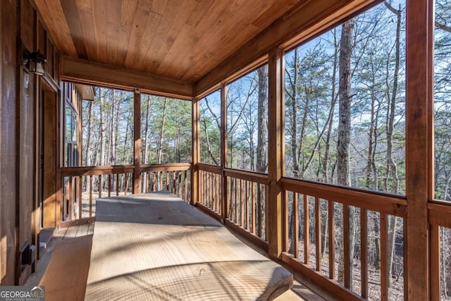 sunroom / solarium with wood ceiling