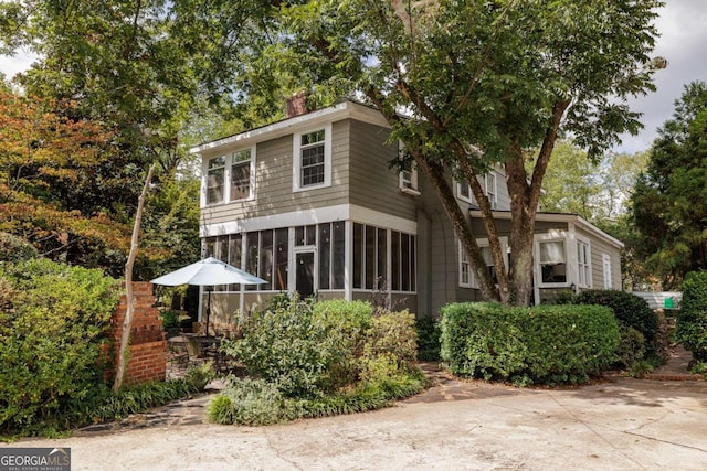 view of front of property with a sunroom