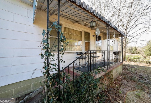 entrance to property with covered porch