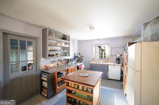 kitchen with white appliances and sink