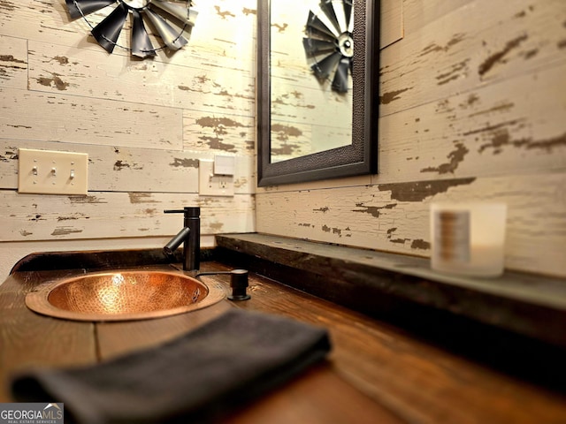 room details with wood walls and a sink