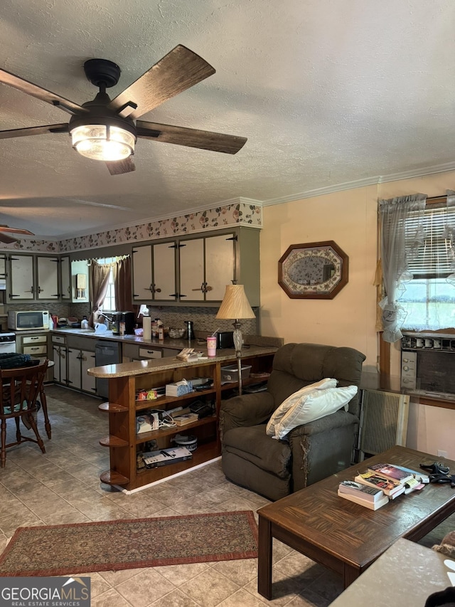 living room featuring crown molding, a textured ceiling, ceiling fan, and tile patterned floors