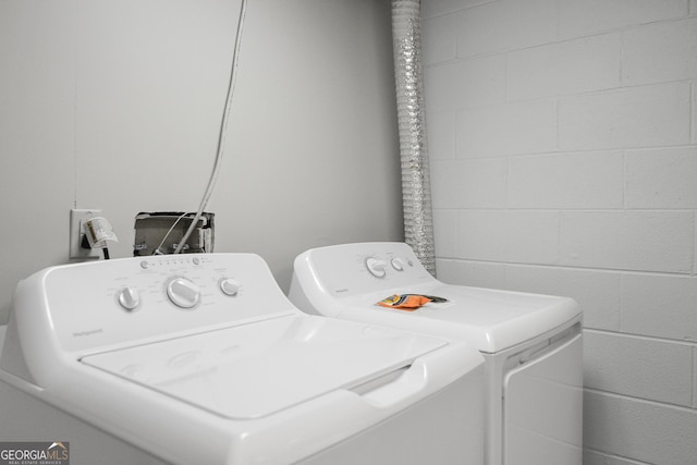 laundry area featuring separate washer and dryer