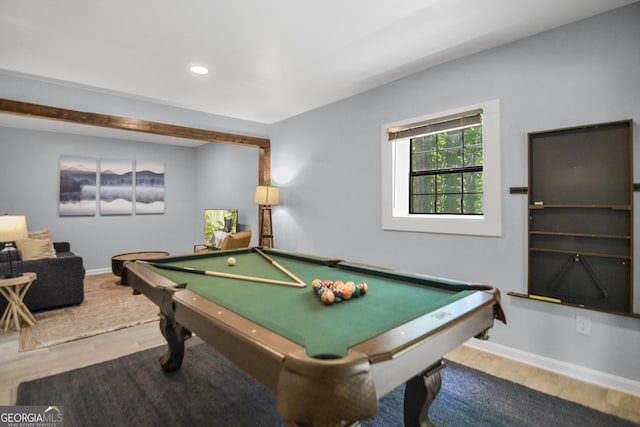 game room with wood-type flooring and pool table