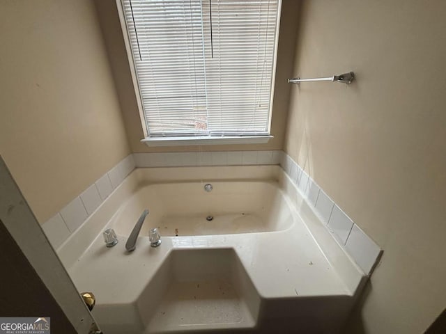 40 Brandon Dr, Covington, GA 30016 - bathroom featuring a bath