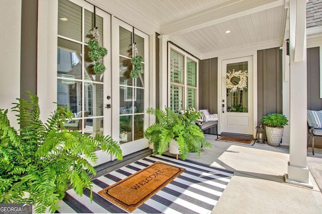 entrance to property featuring french doors