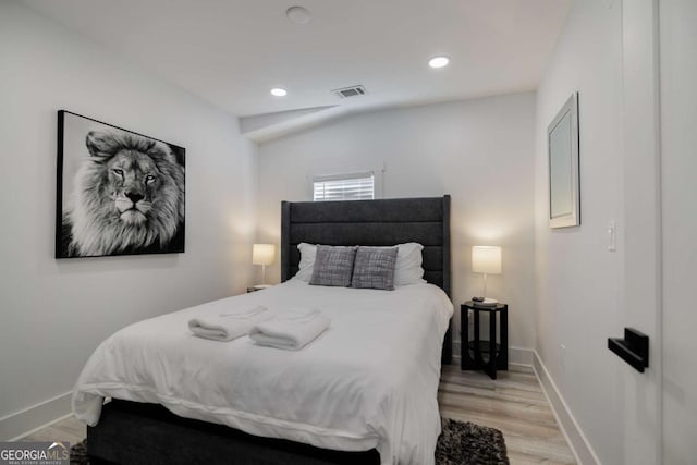 bedroom with light wood-type flooring