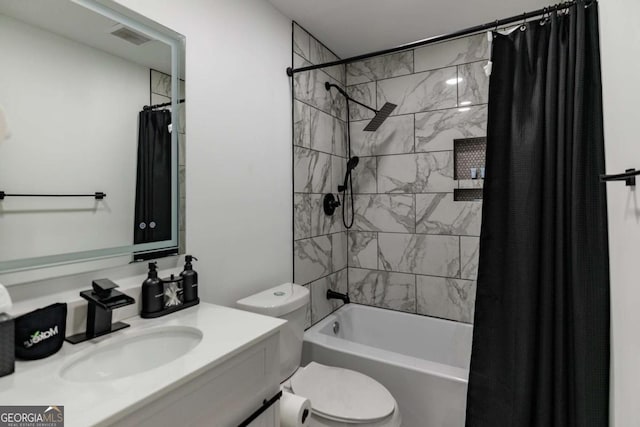 full bathroom featuring vanity, shower / bath combo, and toilet