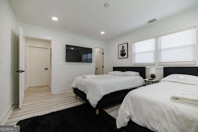 bedroom featuring light wood-type flooring