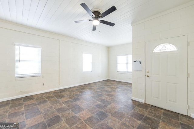 foyer entrance featuring ceiling fan and wood ceiling